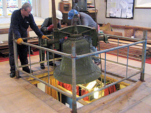 A bell comes down